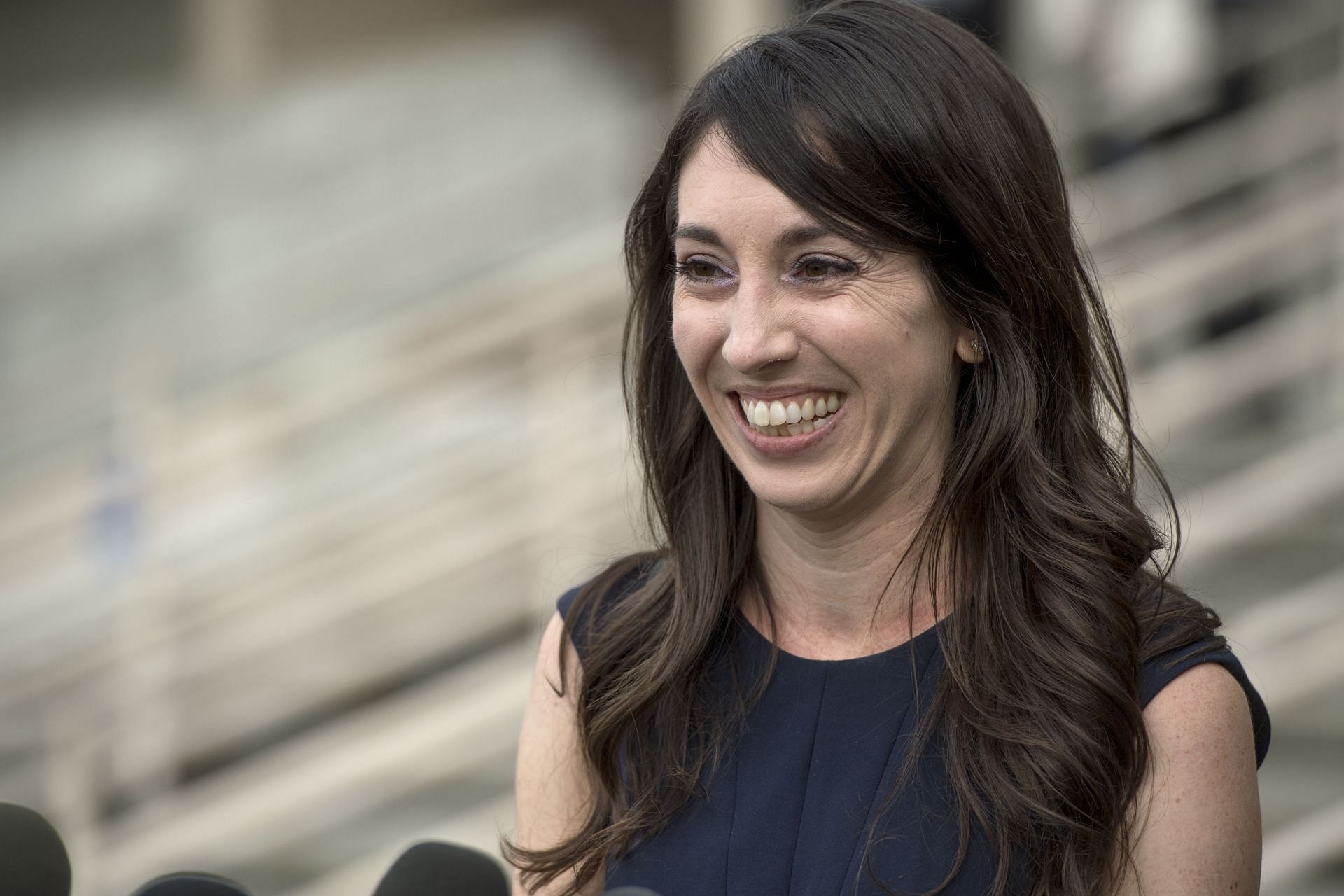 Michelle Hadley addresses the media after being cleared of all charges in a complicated plot to frame her in Fullerton, California (Image via Getty)